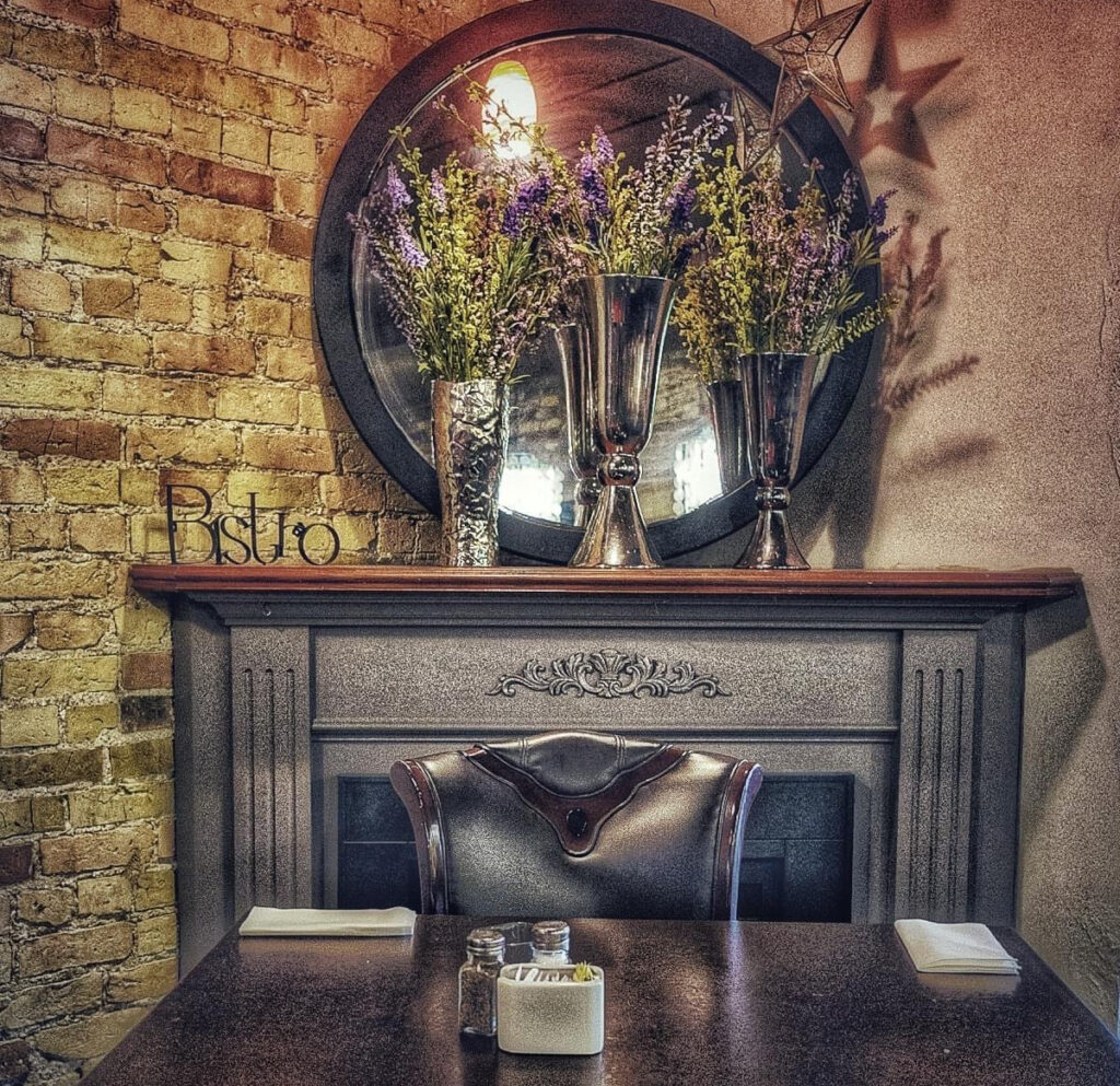 The Bistro St. Thomas restaurant  seating in front of fireplace