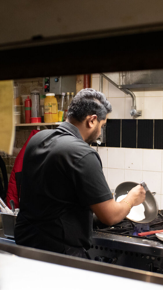 Chef Akshay from the Bistro cooking